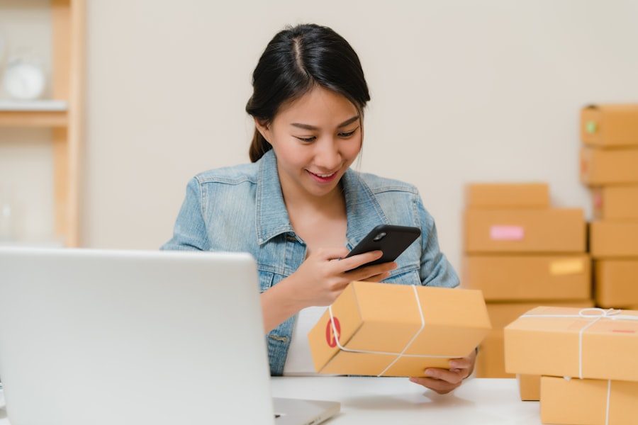 Small business owner checking a package order on her phone